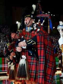 A bagpiper at the Tattoo